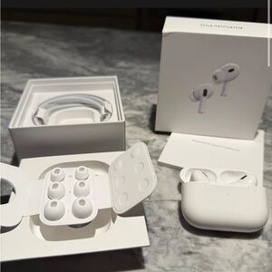 Apple AirPods Pro with White Charging Case and Accessories